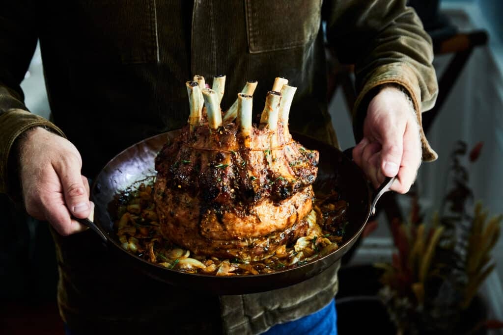 rack of lamb in a cast iron skillet