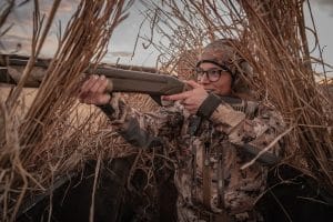 woman wearing sitka waterfowl camo